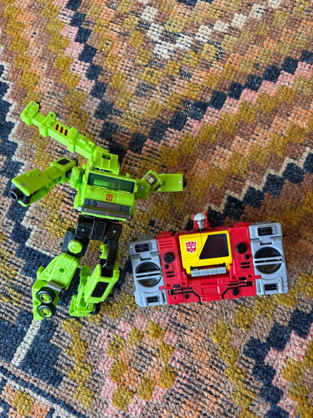 Transformers collectors . Optimus prime and legacy velocitron